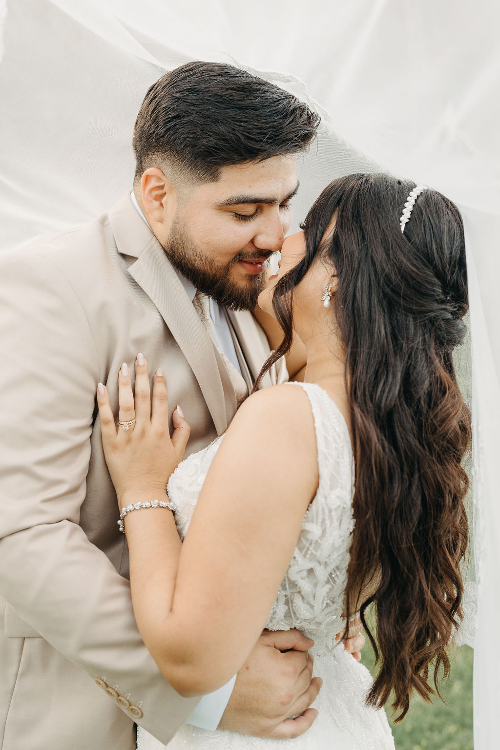 bride and groom take wedding portraits at kualoa ranch in oahu