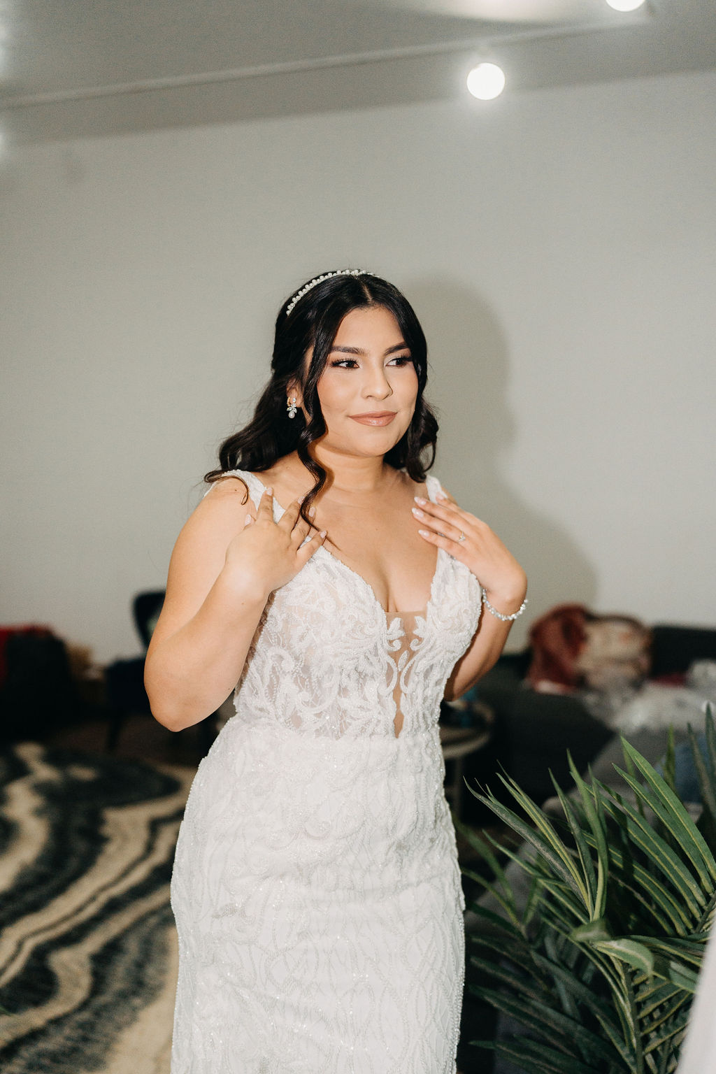 bride getting ready in her suite for her wedding in oahu