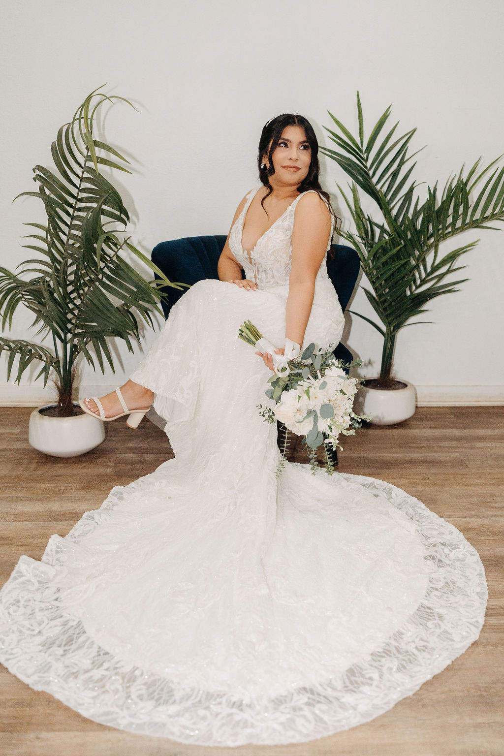 bride getting ready in her suite for her wedding in oahu