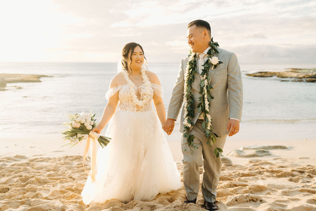 Bride and groom take wedding portraits at  Lanikuhonua Cultural Institute