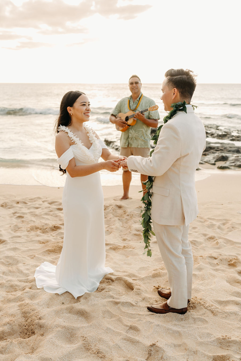 couple has a beach wedding ceremony in Oahu