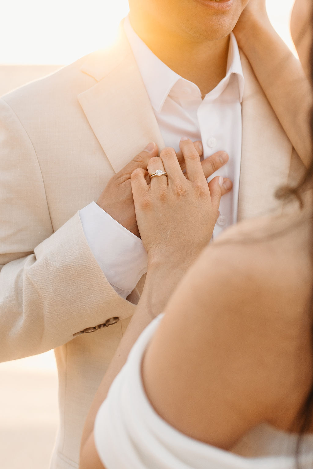 couple takes wedding portraits on a beach in oahu for their beach wedding ceremony