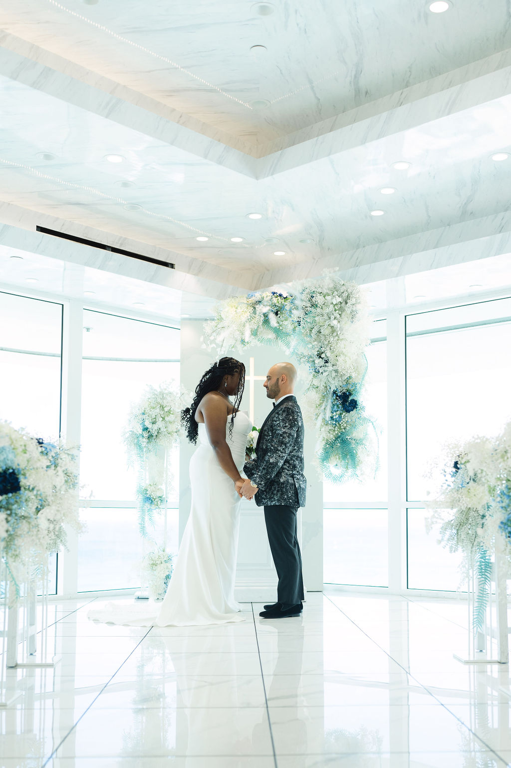 wedding ceremony indoors at a hotel, bride and groom standing at the alter for their ceremony